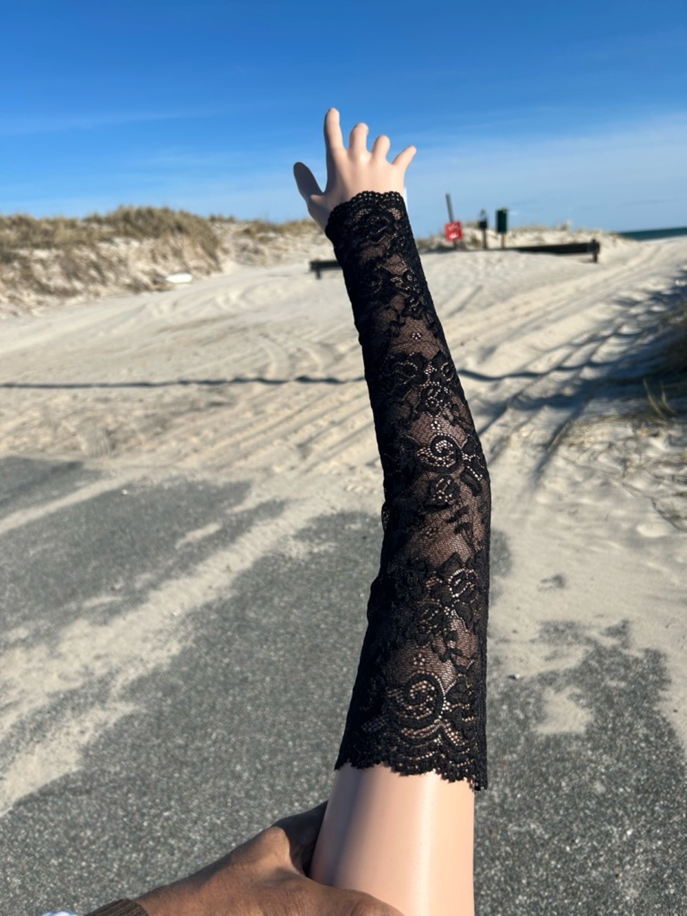 Black Gothic lace fingerless gloves with a floral lace design